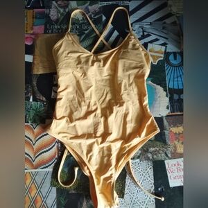 Eidon pale mustard yellow one piece
